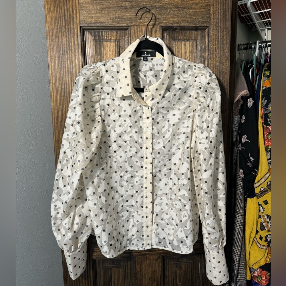 White polka dot shirt with puffy sleeves